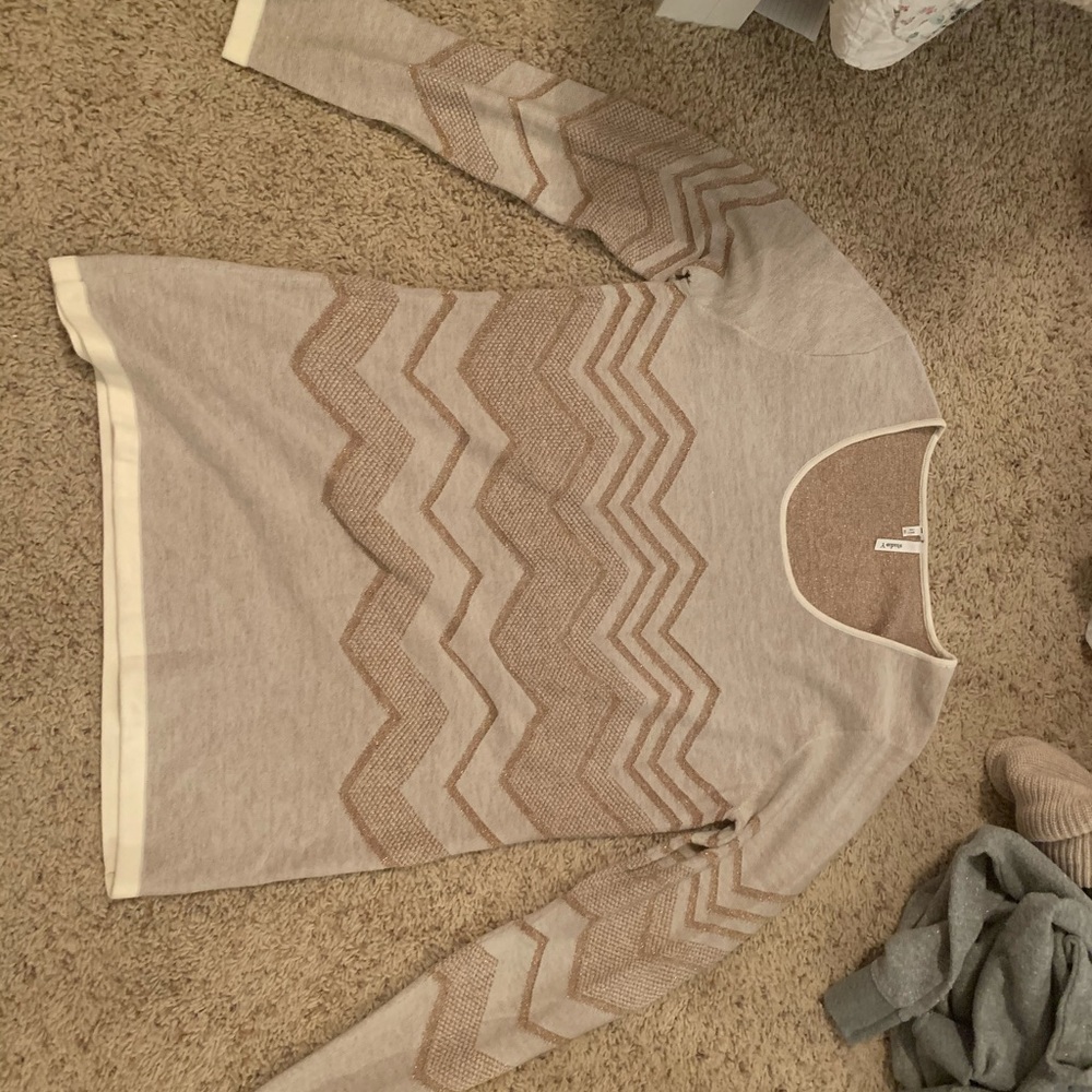 gold sweater